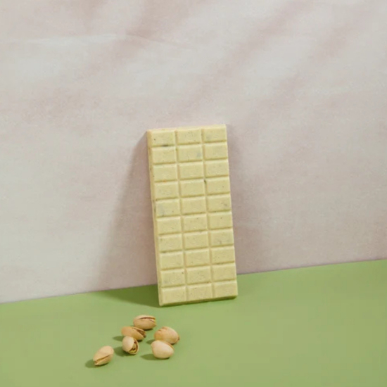 Biała czekolada z prażonymi pistacjami 100g - VANINI - Cioccolato bianco e granella di pistacchio salata