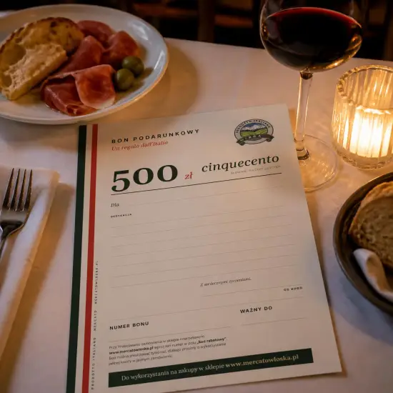 Bon podarunkowy Mercato Tricolore 500 zł na stoliku w restauracji